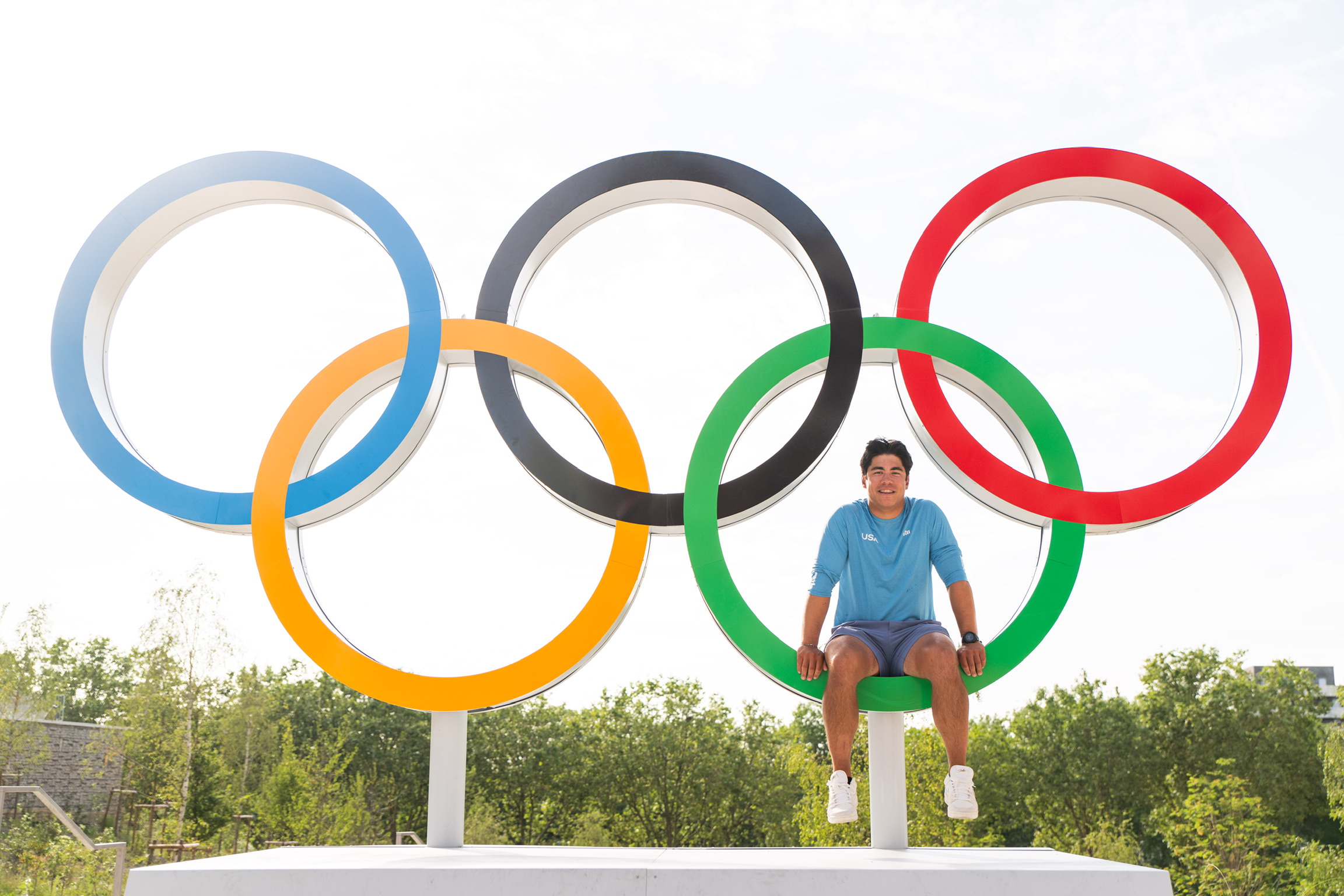 Paris 2024 Olympics — sitting on the Olympic rings